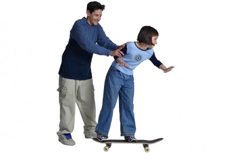 Two young people skateboarding